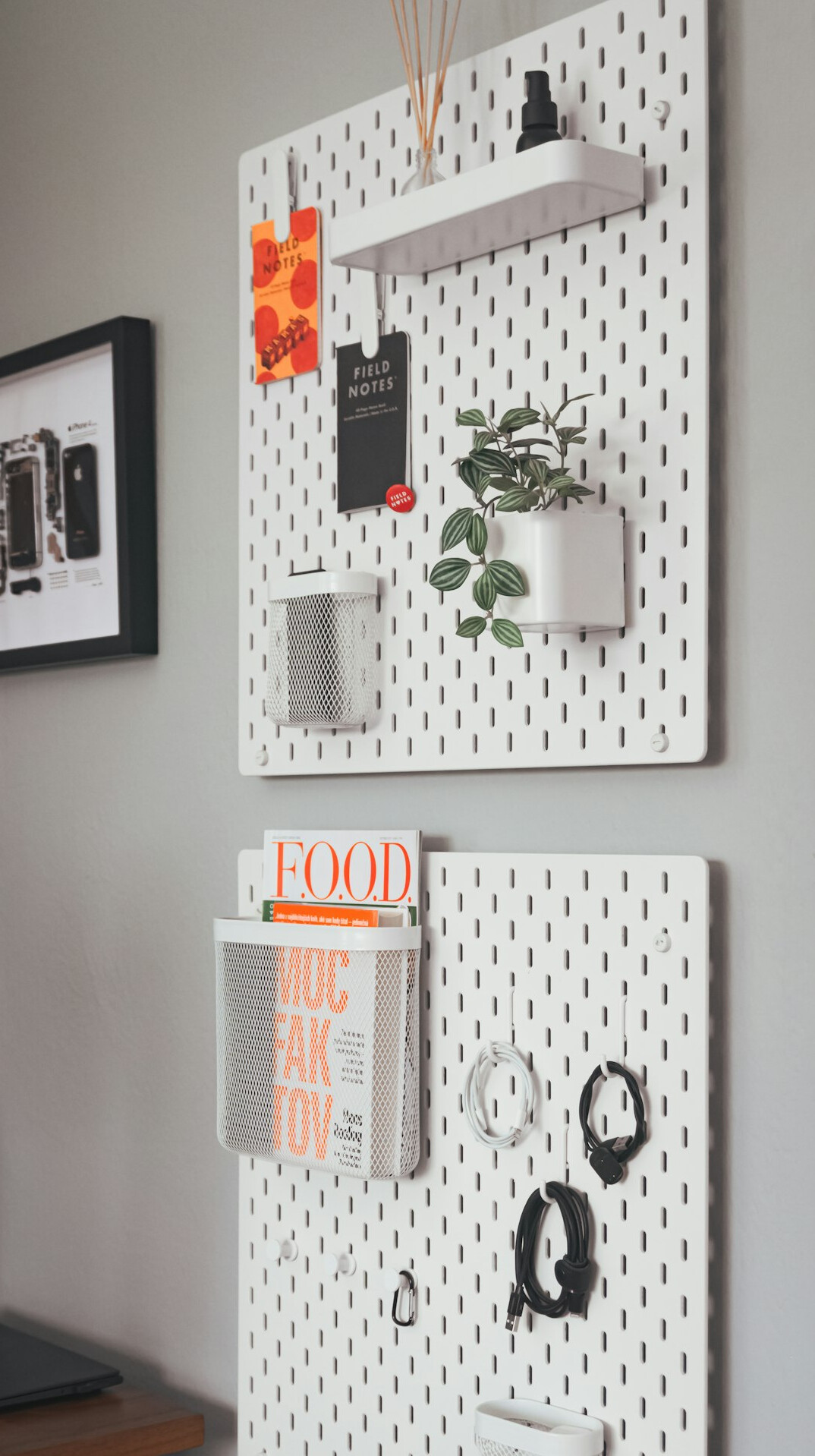 Wooden desk with organized task cards on a board in a bright office